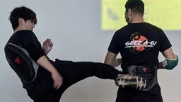Wayne Wong demonstrating a roundhouse kick