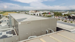 The COMPASS building seen from the air