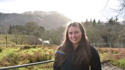 Architecture and Landscape student smiling in wintry rural landscape 