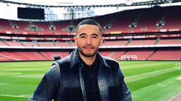 Headshot of Tom in a football stadium