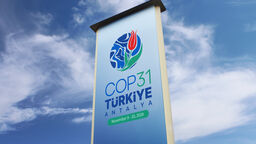 The words "COP31 Antalya | Turkiye" on a large sign