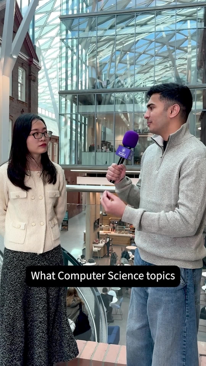 A man and woman talking in the Heartspace Building